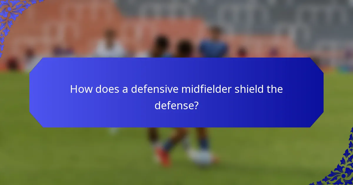 How does a defensive midfielder shield the defense?