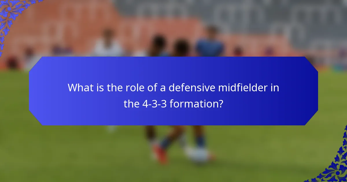 What is the role of a defensive midfielder in the 4-3-3 formation?